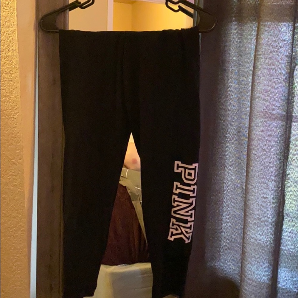 Black vs pink cropped leggings